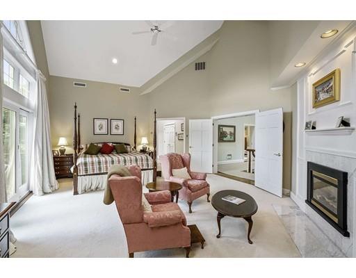 336 Lexington Road Concord, MA 01742 - Photo 15 of 29 a living room with furniture and a fireplace