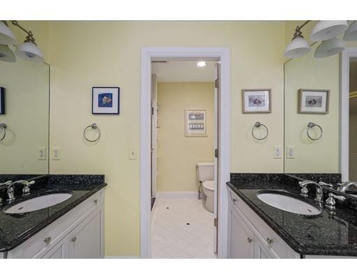 336 Lexington Road Concord, MA 01742 - Photo 19 of 29 a bathroom with a granite countertop sink and a mirror