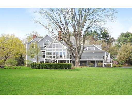336 Lexington Road Concord, MA 01742 - Photo 2 of 29 a front view of house with yard and green space