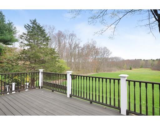 336 Lexington Road Concord, MA 01742 - Photo 26 of 29 a view of a balcony with wooden floor and fence