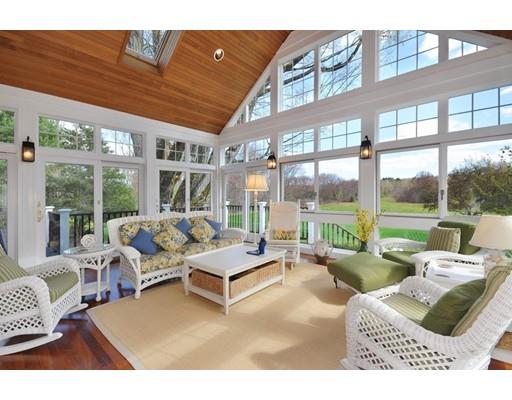 336 Lexington Road Concord, MA 01742 - Photo 4 of 29 a living room with furniture and a large window