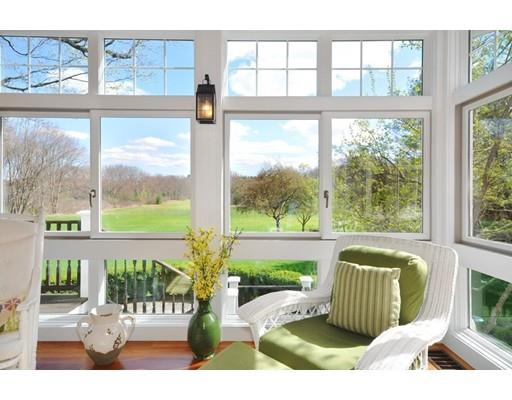 336 Lexington Road Concord, MA 01742 - Photo 5 of 29 a front view of a house with a porch