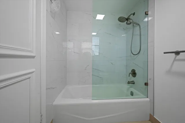 a bathroom with a bath tub
