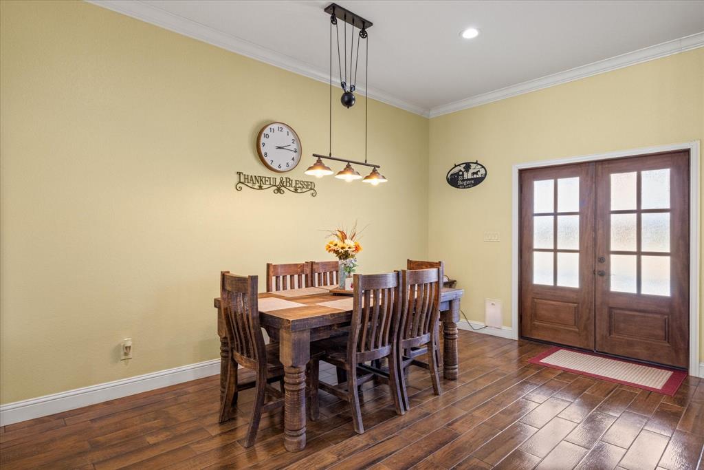 9739 Waldrup Road Lipan, TX 76462 - Photo 15 of 38 This dining area is big enough for your longest farm tables.