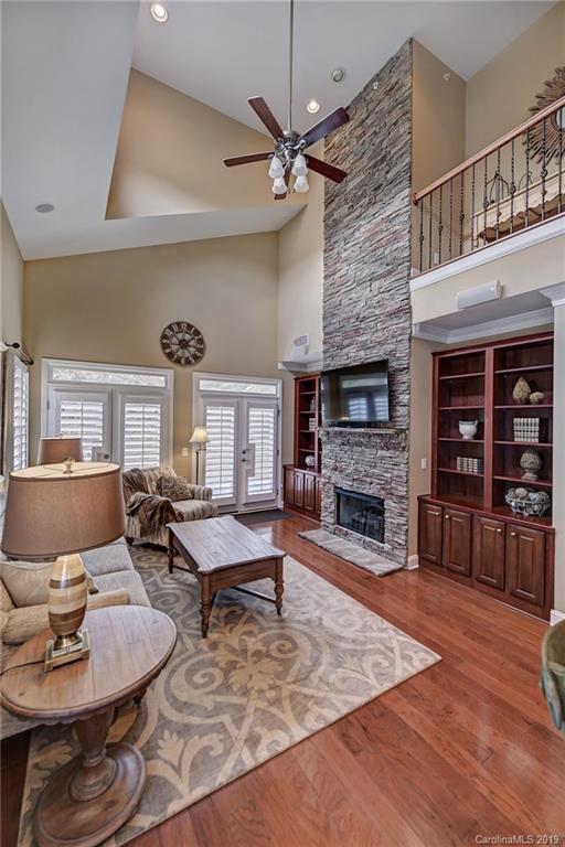 405 Halyard Lane Tega Cay, SC 29708 - Photo 18 of 48 a living room with furniture and a fireplace