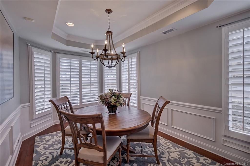 405 Halyard Lane Tega Cay, SC 29708 - Photo 4 of 48 a view of a dining room with furniture and chandelier