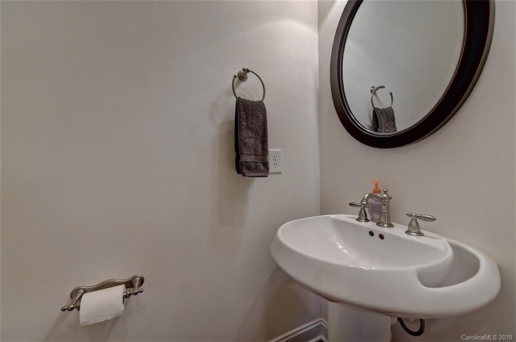 405 Halyard Lane Tega Cay, SC 29708 - Photo 31 of 48 a bathroom with a sink and a mirror