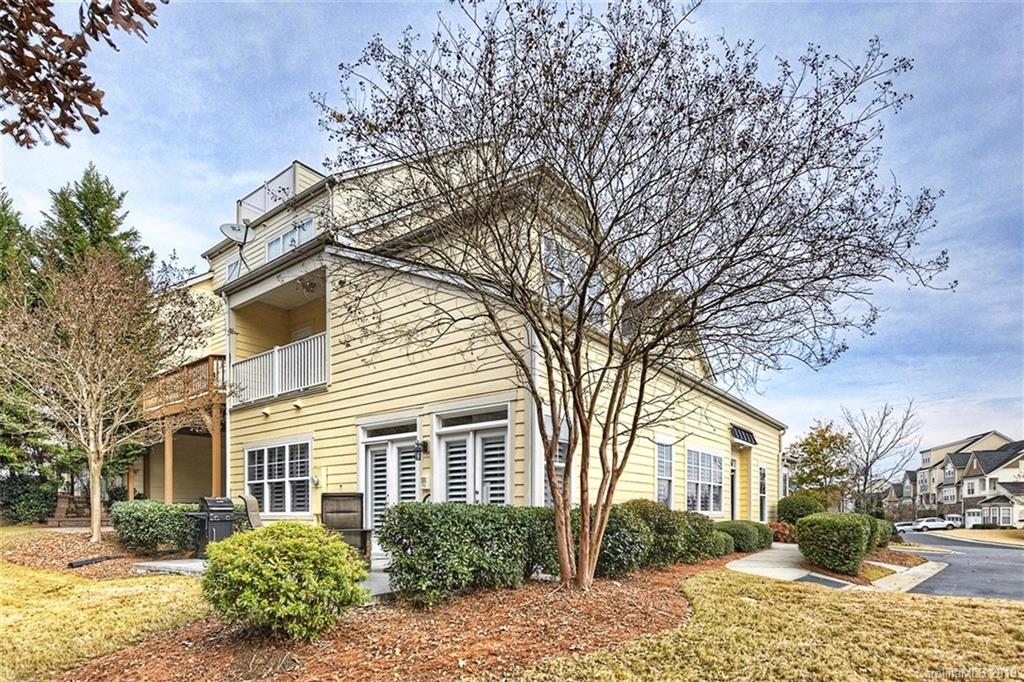 405 Halyard Lane Tega Cay, SC 29708 - Photo 47 of 48 a front view of a house with a yard and trees