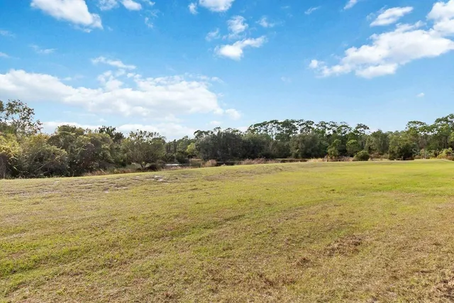 a view of a swimming pool and outdoor space