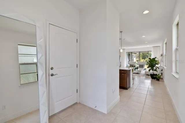 a view of kitchen and dining area with furniture