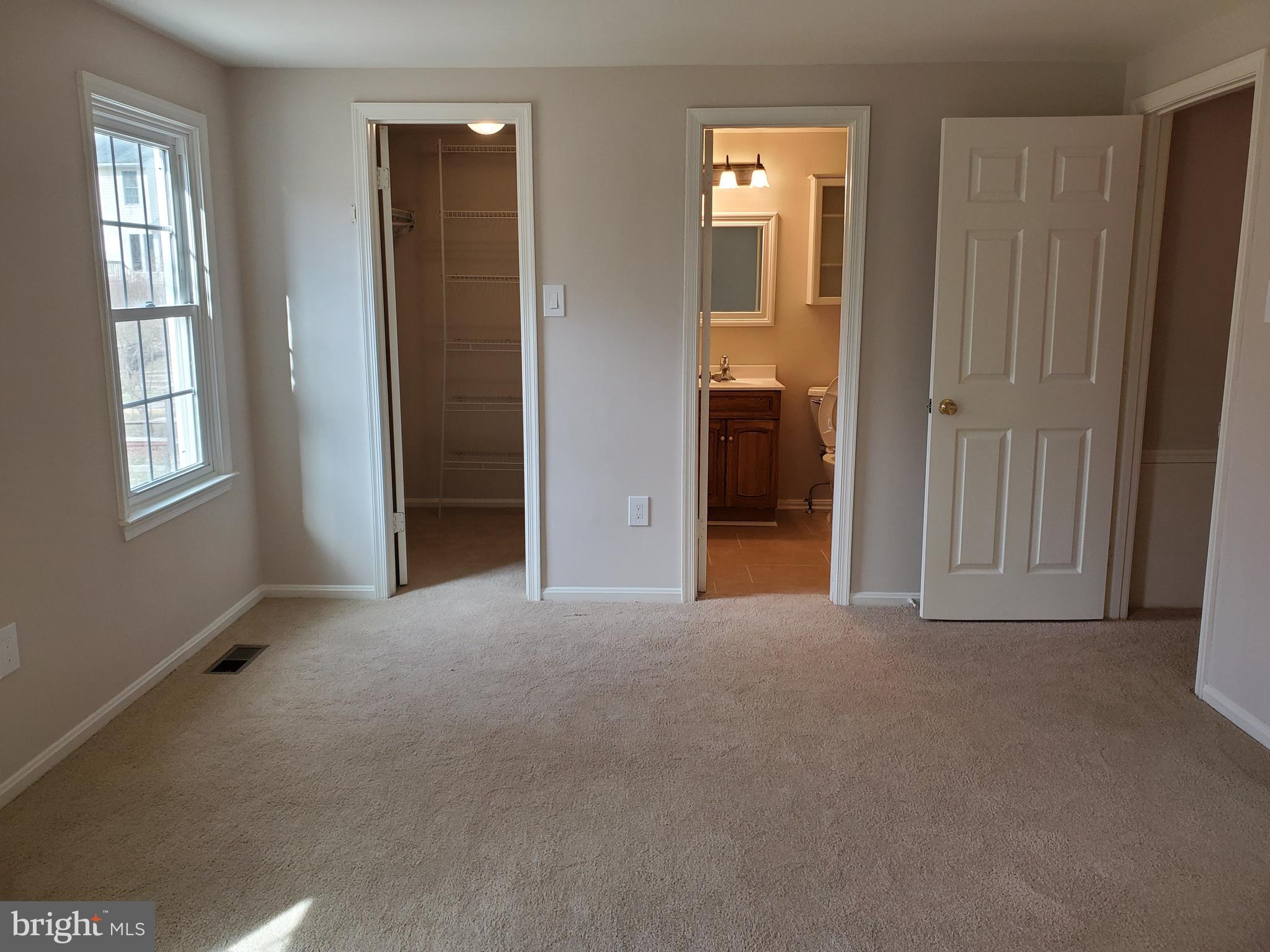 10128 Roveout Lane Columbia, MD 21046 - Photo 18 of 35 Master walk-in closet and bath