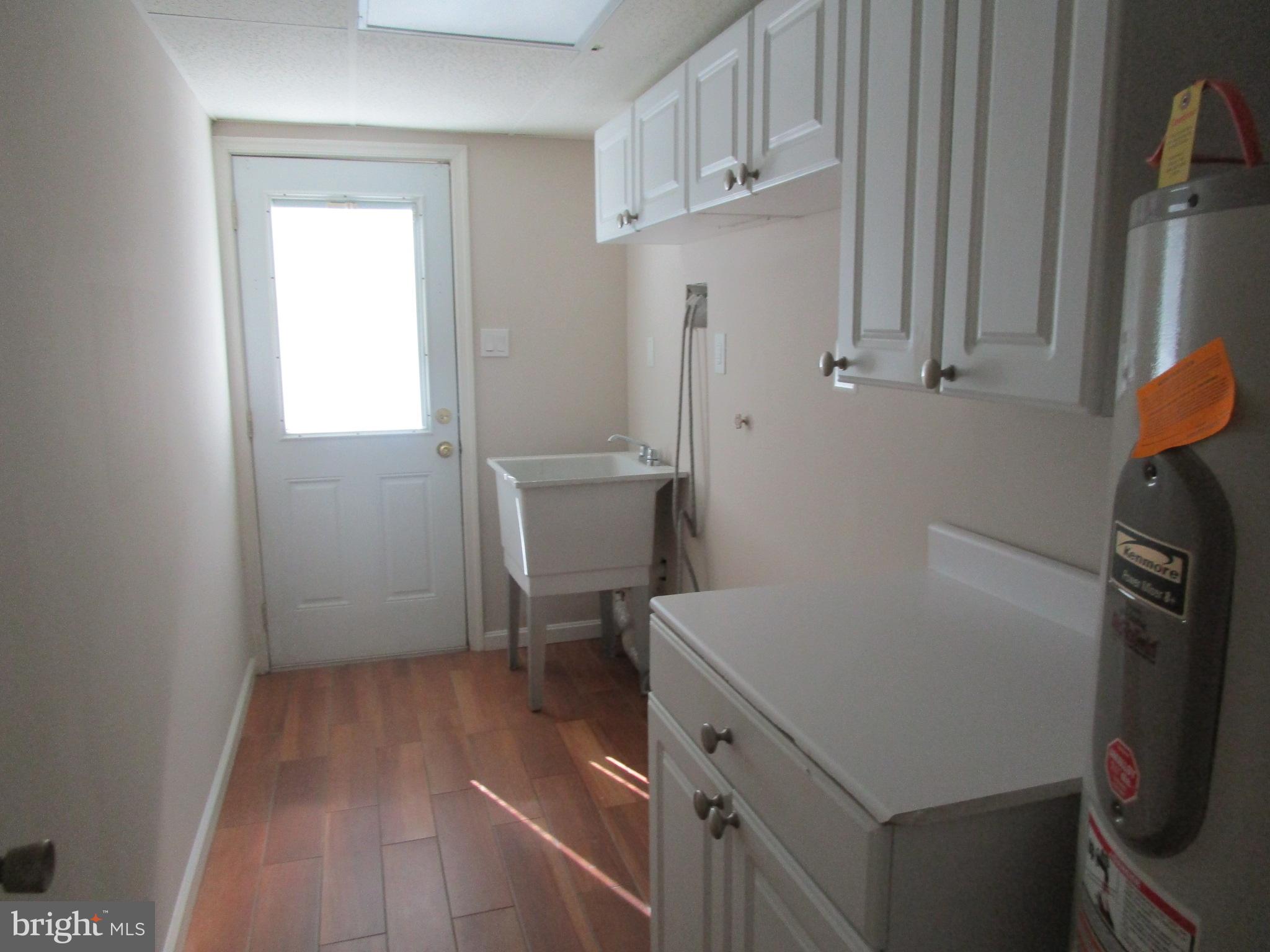10128 Roveout Lane Columbia, MD 21046 - Photo 32 of 35 Mudroom/Laundry on main level