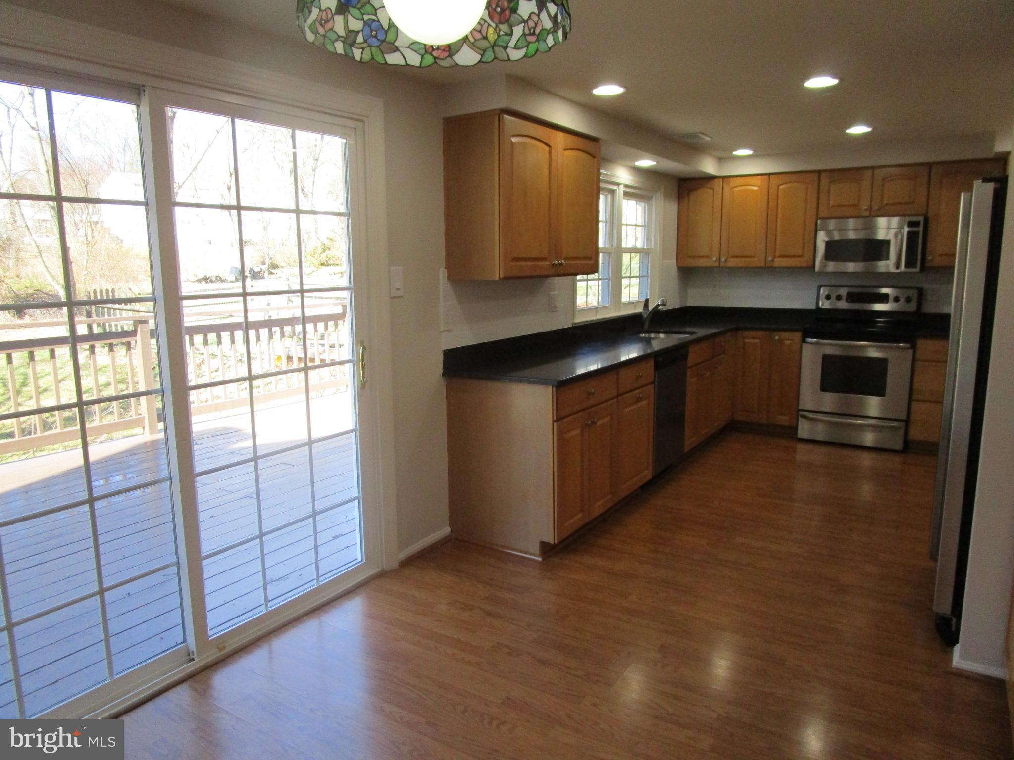 10128 Roveout Lane Columbia, MD 21046 - Photo 10 of 35 Upgraded cabinets, granite countertops