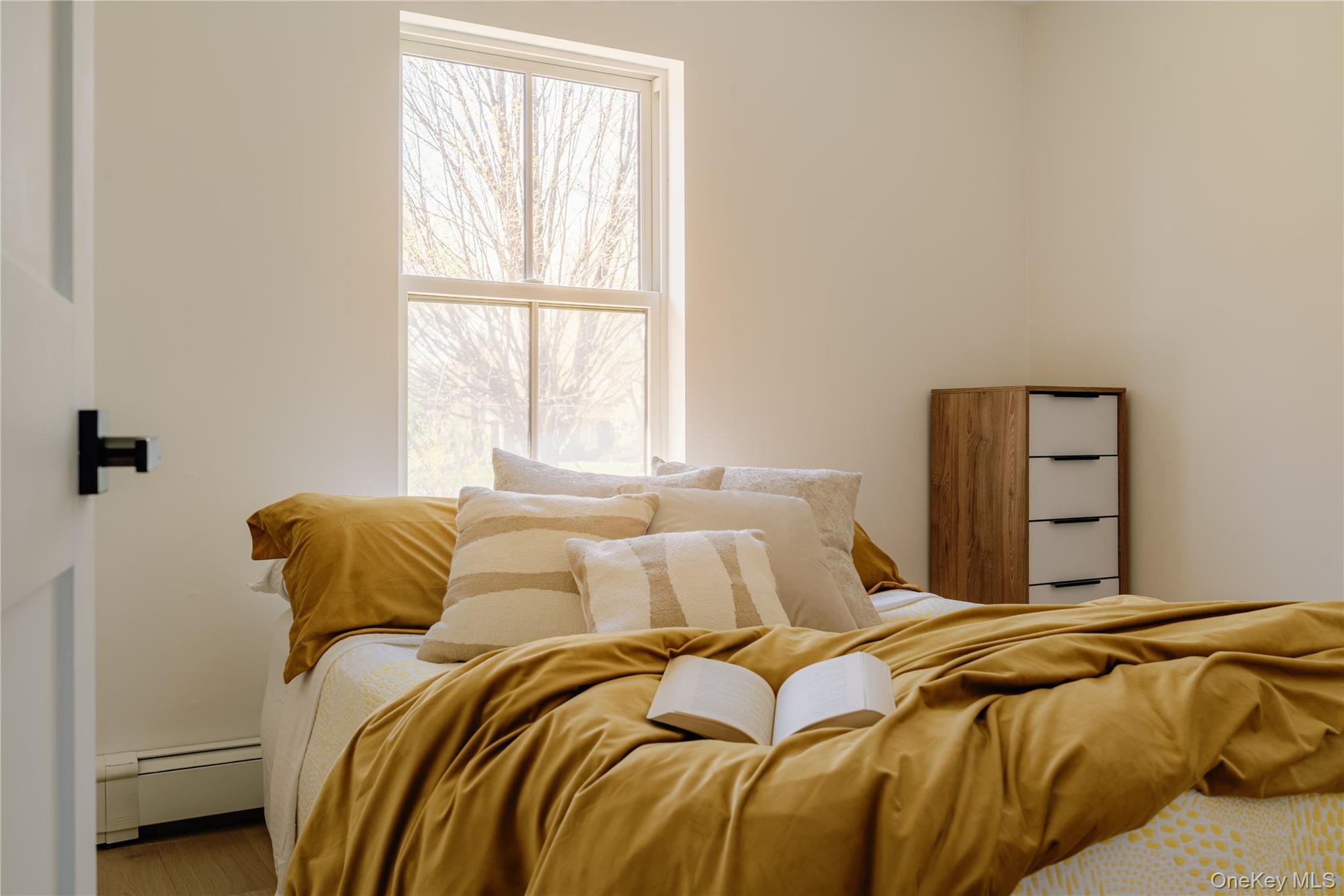 214 Wallkill Road Walden, NY 12586 - Photo 20 of 30 a bedroom with a bed and a window