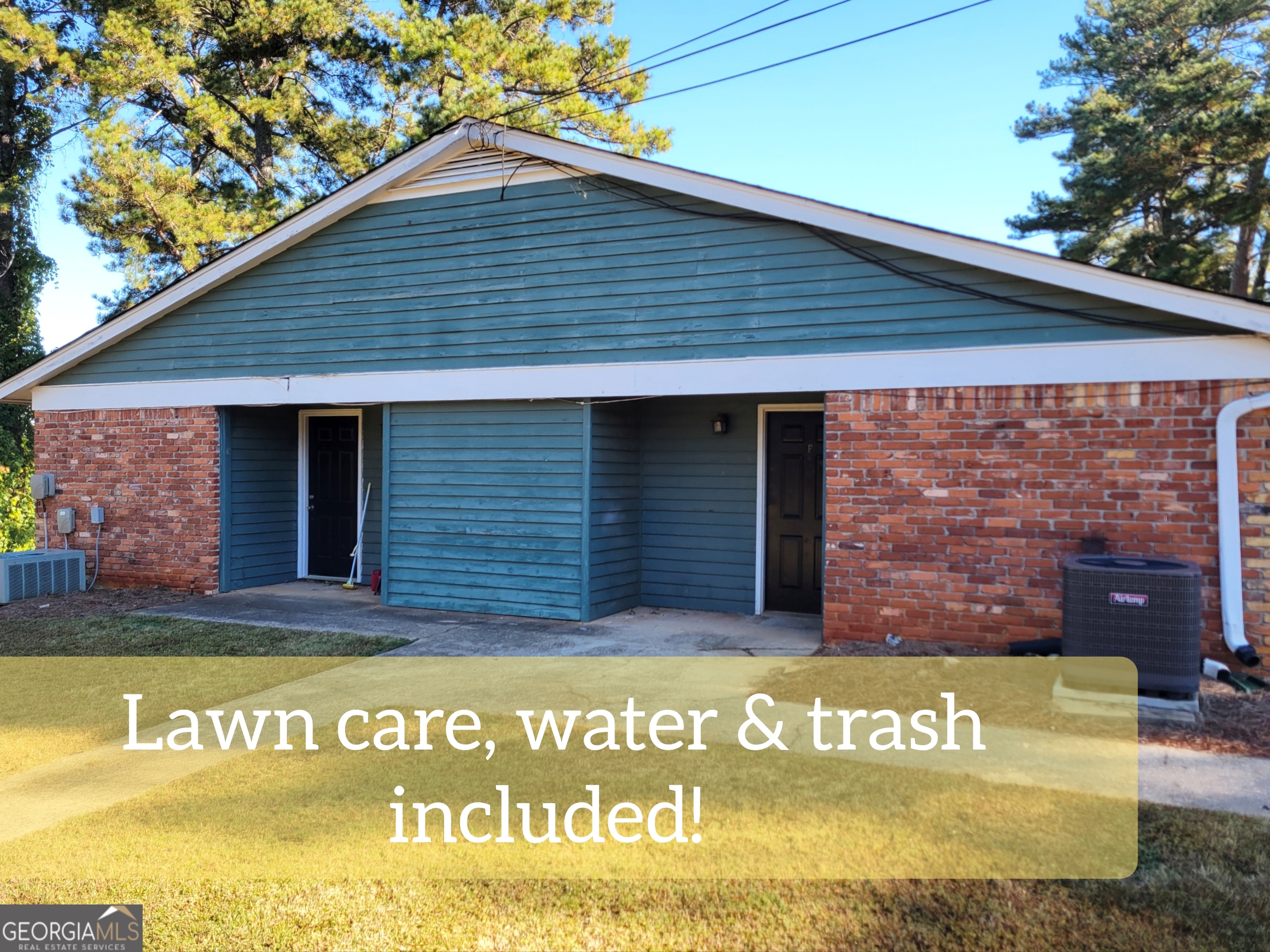 422 Highway 211 Street Northwest, Unit F Winder, GA 30680 - Photo 1 of 9 a view of a house with a wooden door