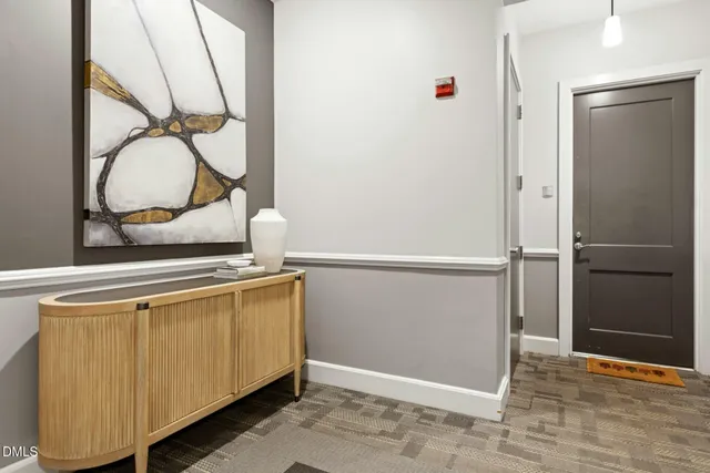 a kitchen with a refrigerator and a sink