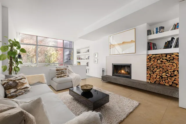 a black and white photo of a living room