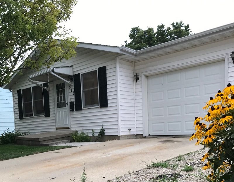 515 South 12th Street Rochelle, IL 61068 - Photo 23 of 25 a view of a house with a yard
