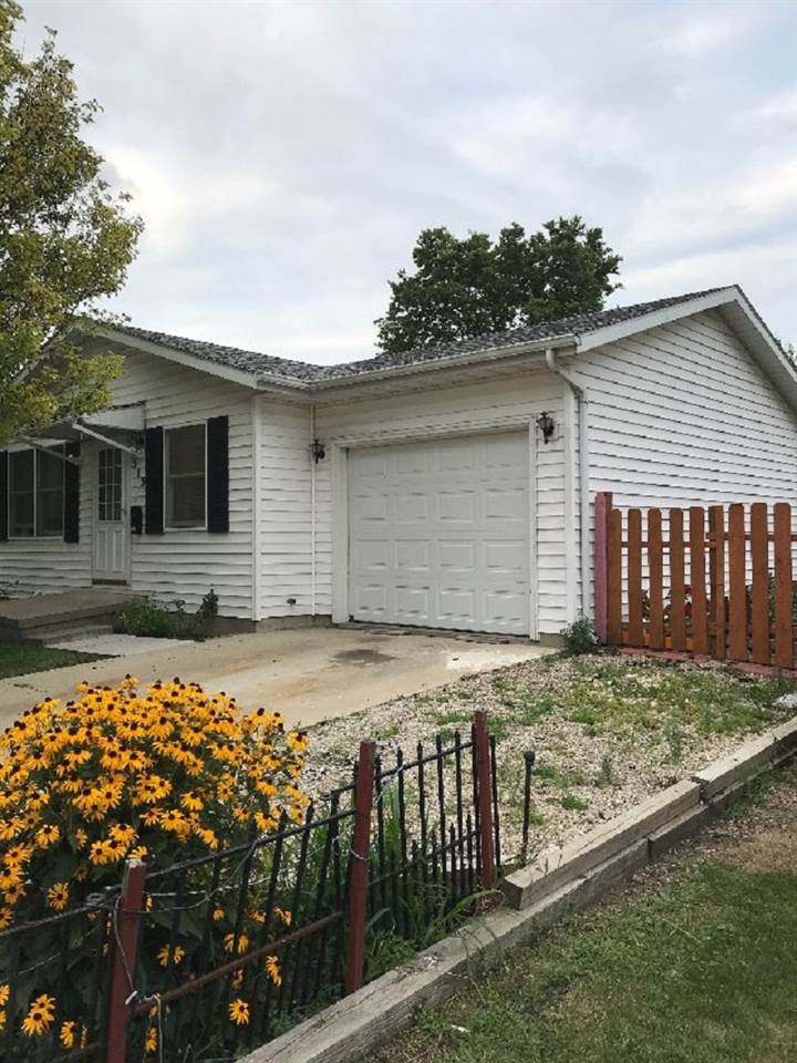 515 South 12th Street Rochelle, IL 61068 - Photo 25 of 25 a front view of a house with garden