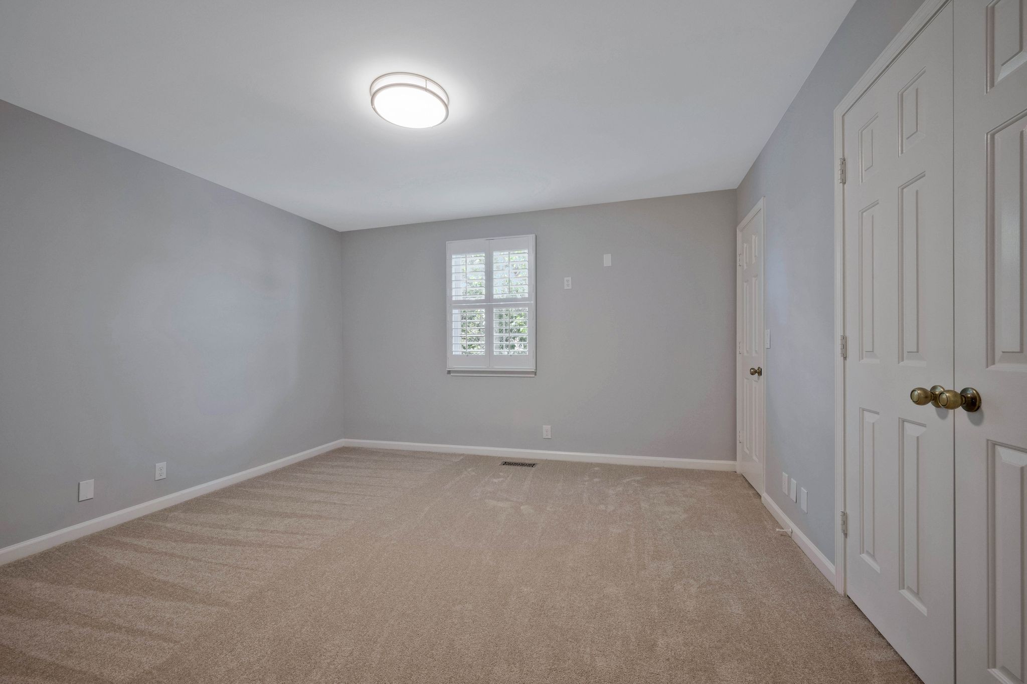 827 General George Patton Road Nashville, TN 37221 - Photo 16 of 26 a view of an empty room with a window