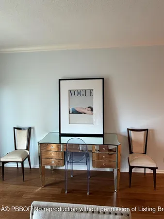 a view of a livingroom with furniture and bench