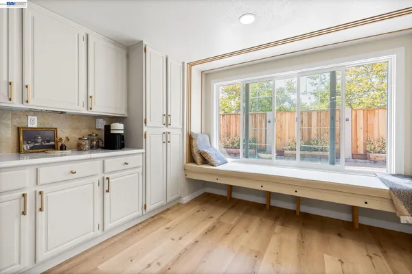 a bathroom with a bathtub and a window