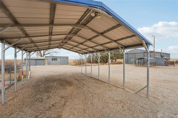 a view of a terrace with sitting area