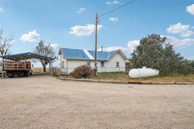 a picture of a park with furniture