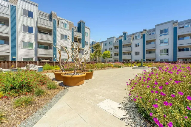 a view of lot of multi story residential apartment building