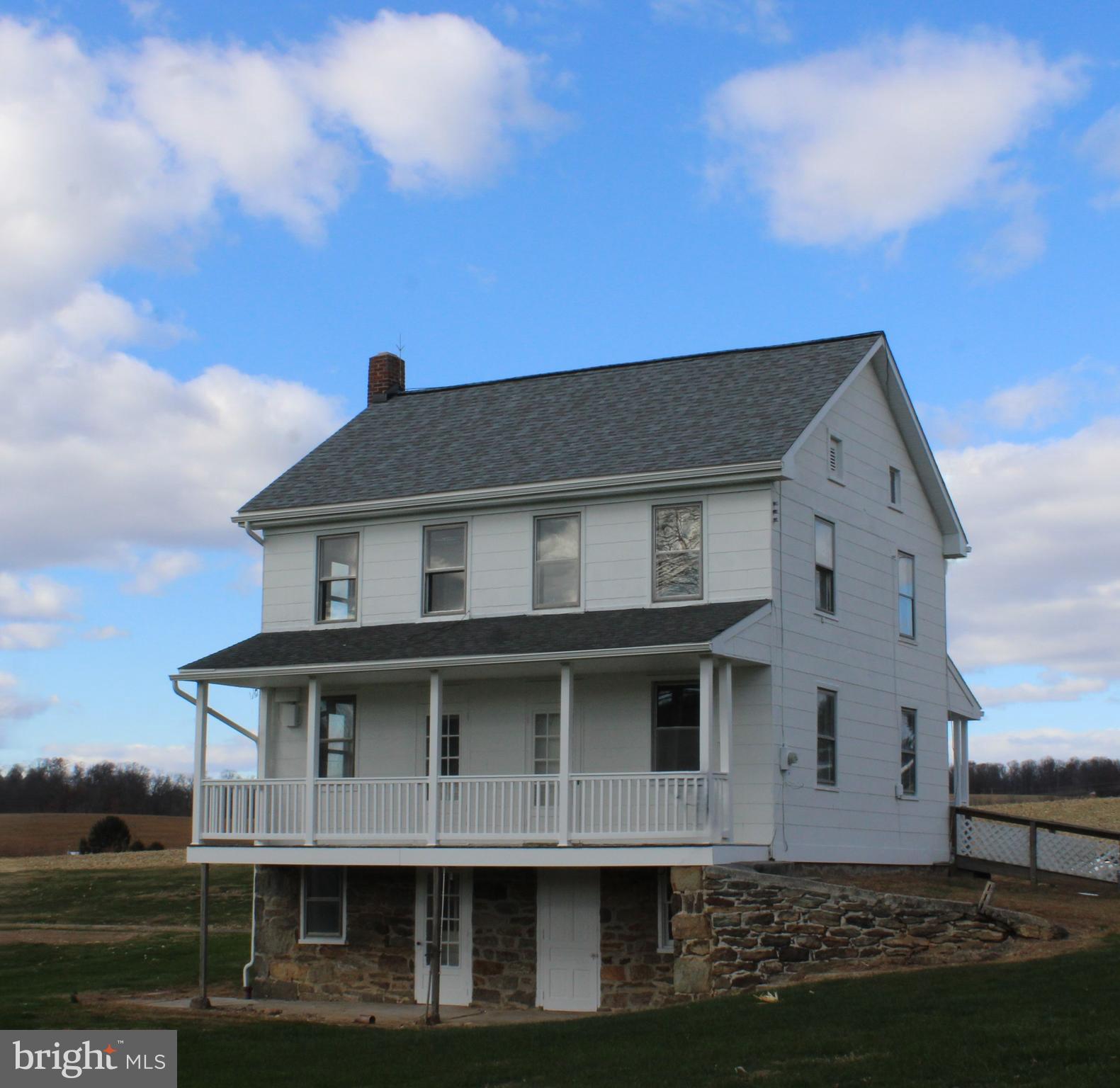 5034 Miller Road Glenville, PA 17329 - Photo 1 of 6 a front view of a house with a yard