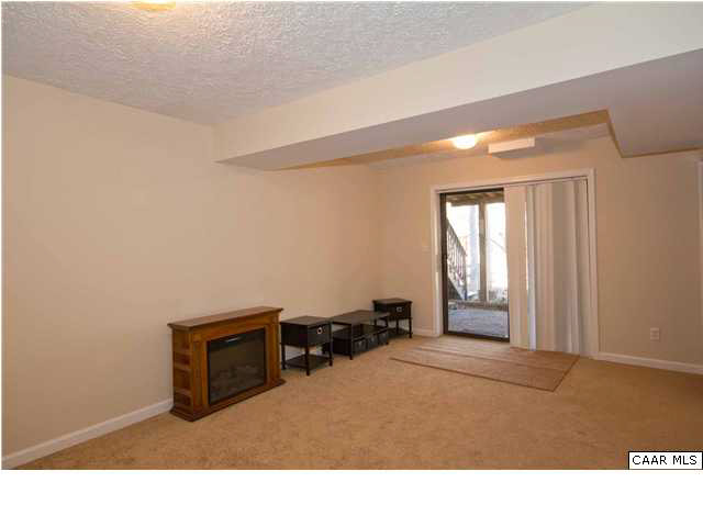 37 Colonial Road Palmyra, VA 22963 - Photo 17 of 22 a room with furniture and a fireplace