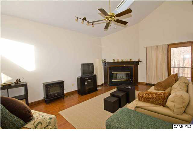 37 Colonial Road Palmyra, VA 22963 - Photo 5 of 22 a living room with furniture and a fireplace