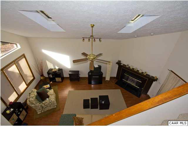 37 Colonial Road Palmyra, VA 22963 - Photo 6 of 22 a kitchen with sink refrigerator and stove