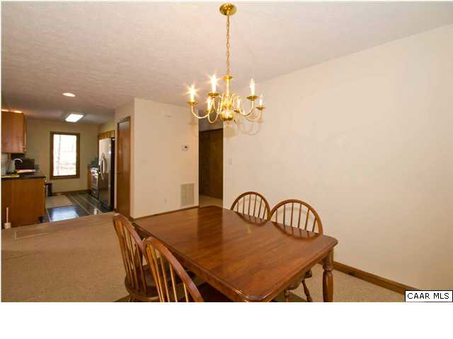 37 Colonial Road Palmyra, VA 22963 - Photo 9 of 22 a kitchen with a table and chairs