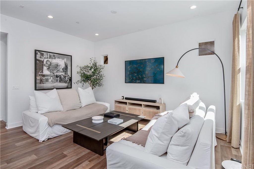 575 Daniel Freeman Circle Inglewood, CA 90301 - Photo 5 of 42 a living room with furniture and a flat screen tv
