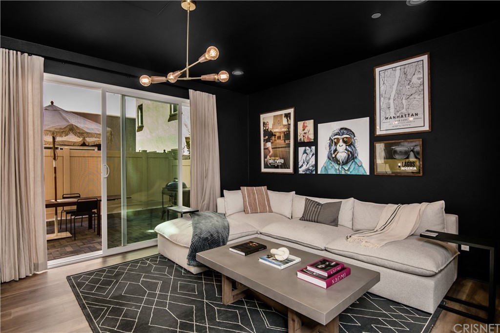 575 Daniel Freeman Circle Inglewood, CA 90301 - Photo 8 of 42 a living room with furniture and a floor to ceiling window