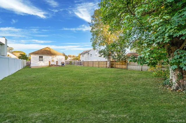 a view of a house with a big yard
