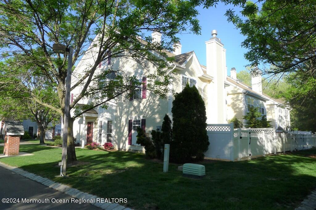 5 Oxford Road Holmdel, NJ 07733 - Photo 8 of 16 a backyard of a house with lots of green space