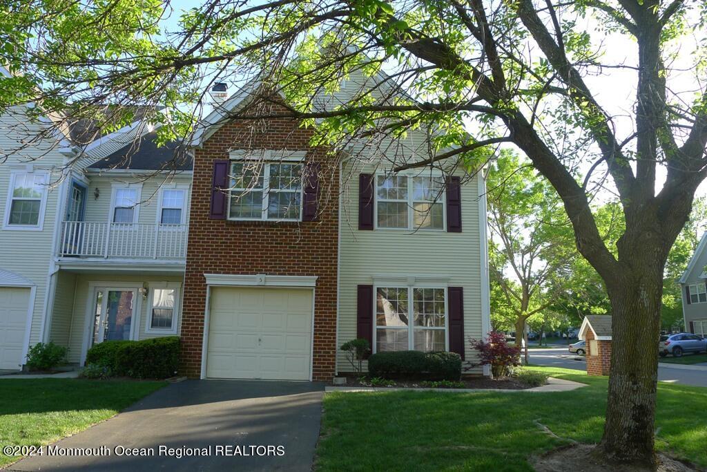 5 Oxford Road Holmdel, NJ 07733 - Photo 9 of 16 a front view of a house with a yard