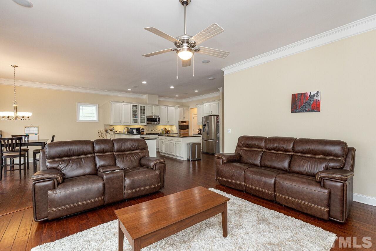 1536 Rodessa Run Raleigh, NC 27607 - Photo 16 of 53 a view of a living room kitchen and a couch