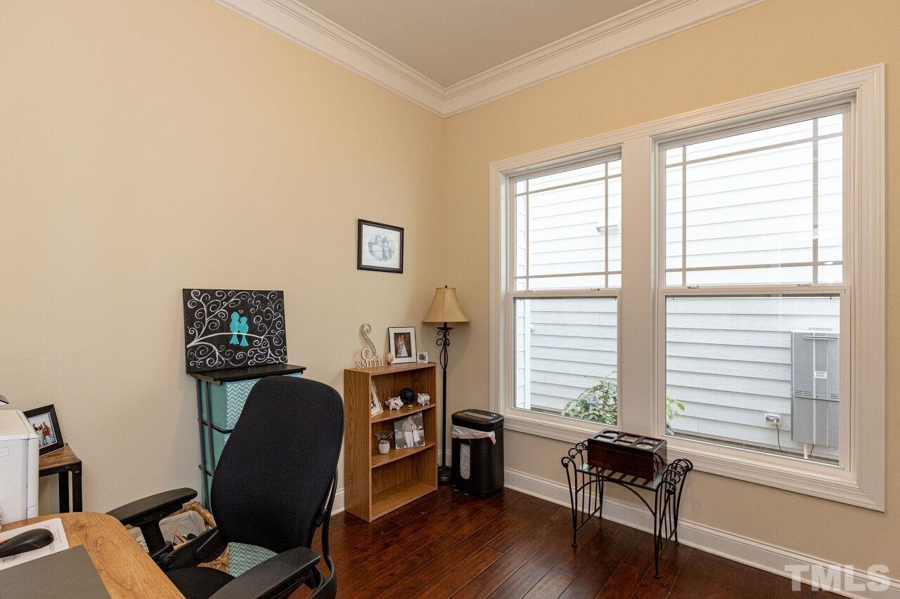 1536 Rodessa Run Raleigh, NC 27607 - Photo 17 of 53 a view of a workspace with furniture and a window