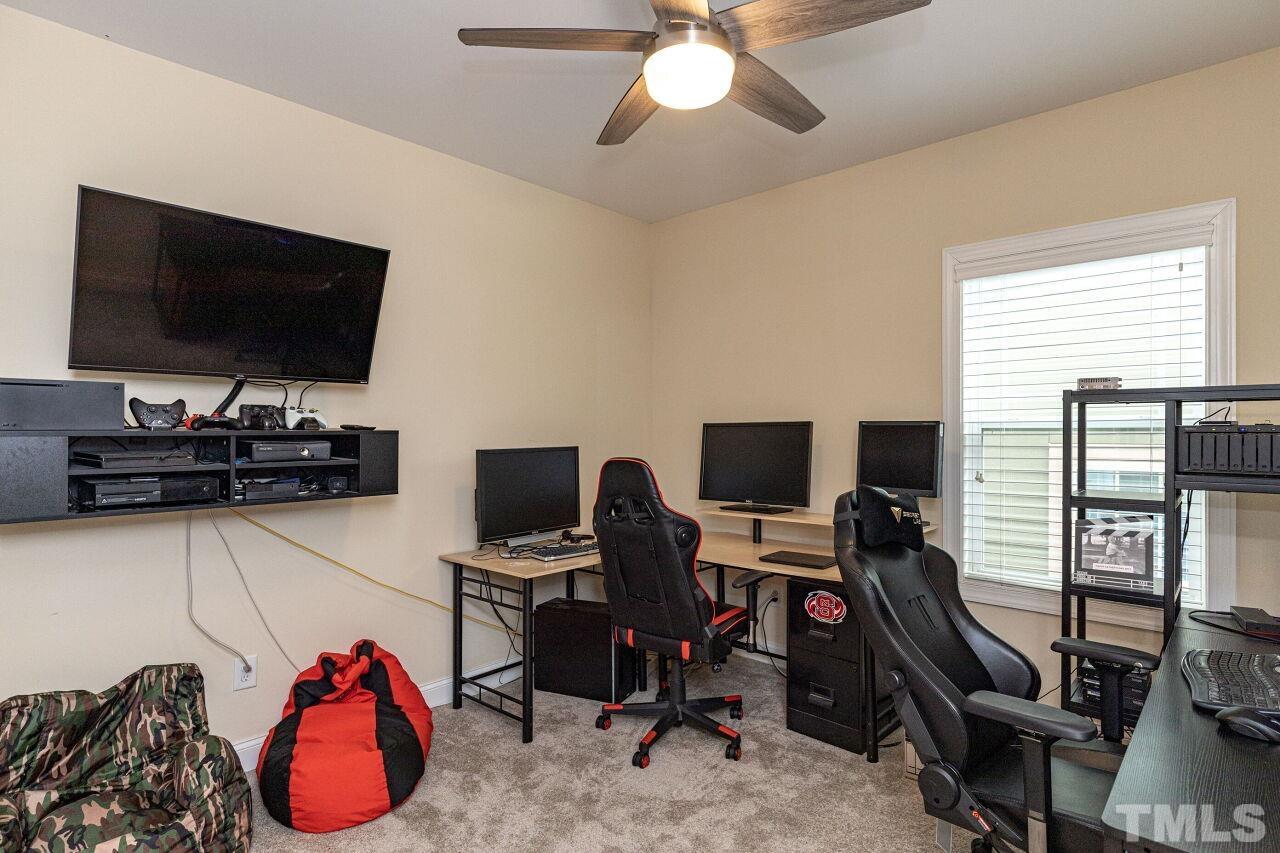 1536 Rodessa Run Raleigh, NC 27607 - Photo 27 of 53 a view of a workspace with furniture and a window