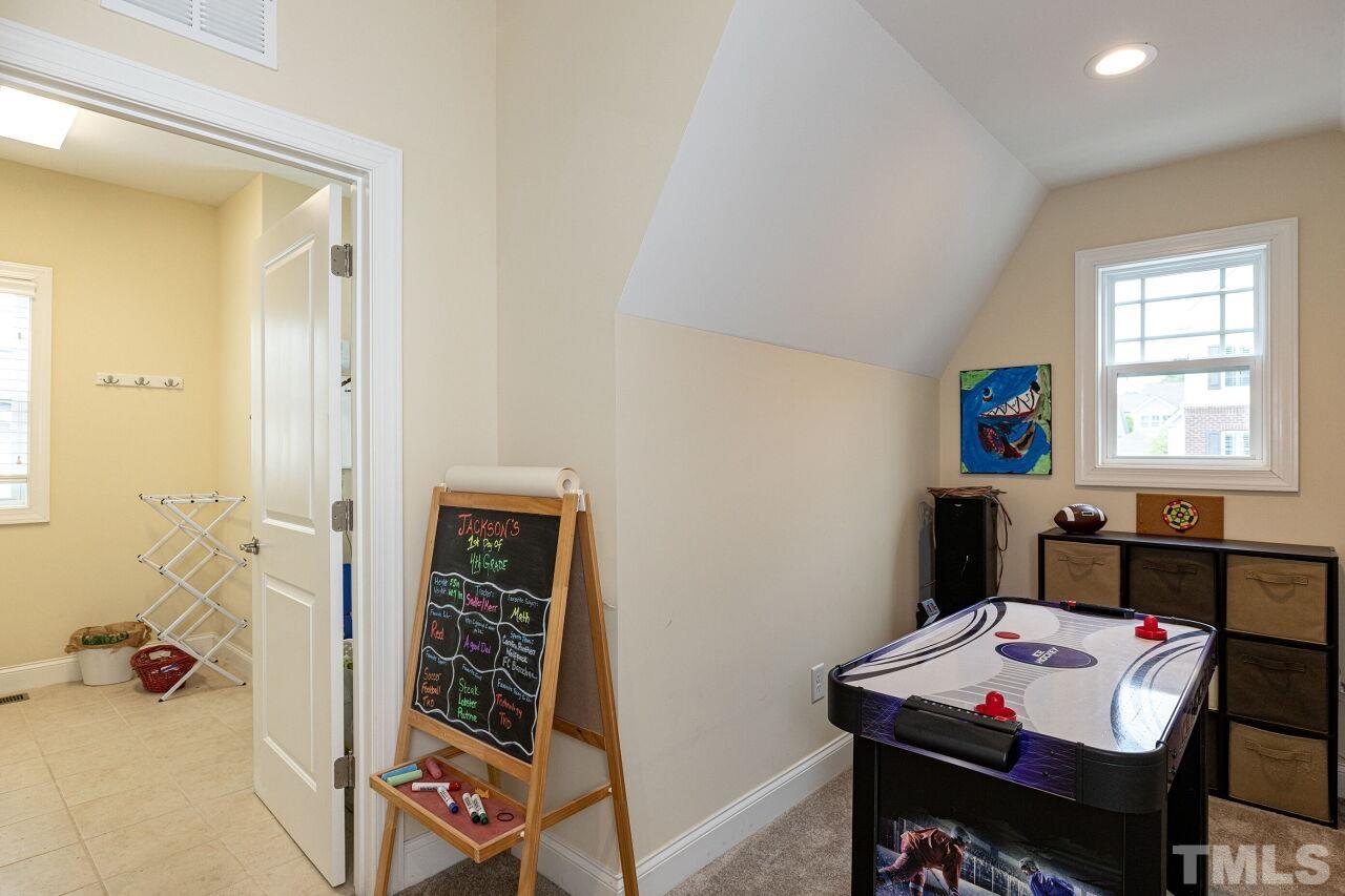 1536 Rodessa Run Raleigh, NC 27607 - Photo 33 of 53 a view of a workspace with furniture and a window