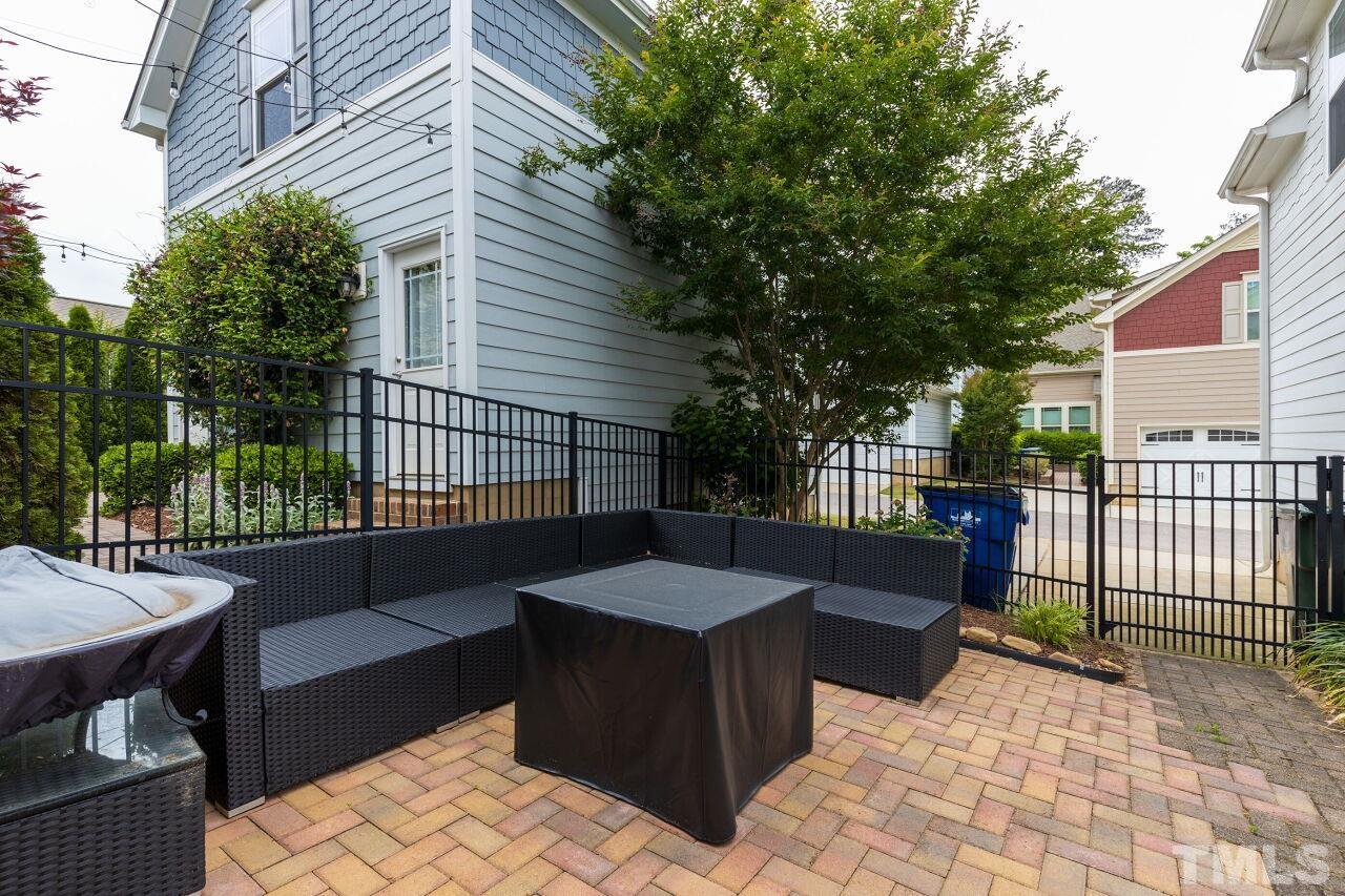 1536 Rodessa Run Raleigh, NC 27607 - Photo 37 of 53 a building outdoor space with patio furniture