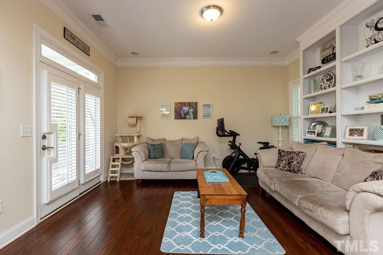 1536 Rodessa Run Raleigh, NC 27607 - Photo 5 of 53 a living room with furniture and a wooden floor
