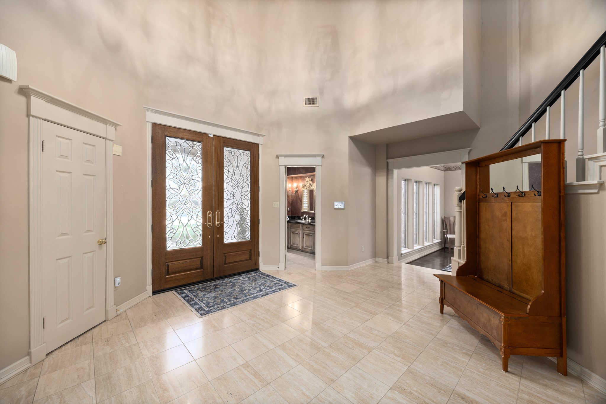 8807 Chelmsford Lane Spring, TX 77379 - Photo 6 of 50 A first floor half bath is tucked away at the front of them home, away from entertaining areas.