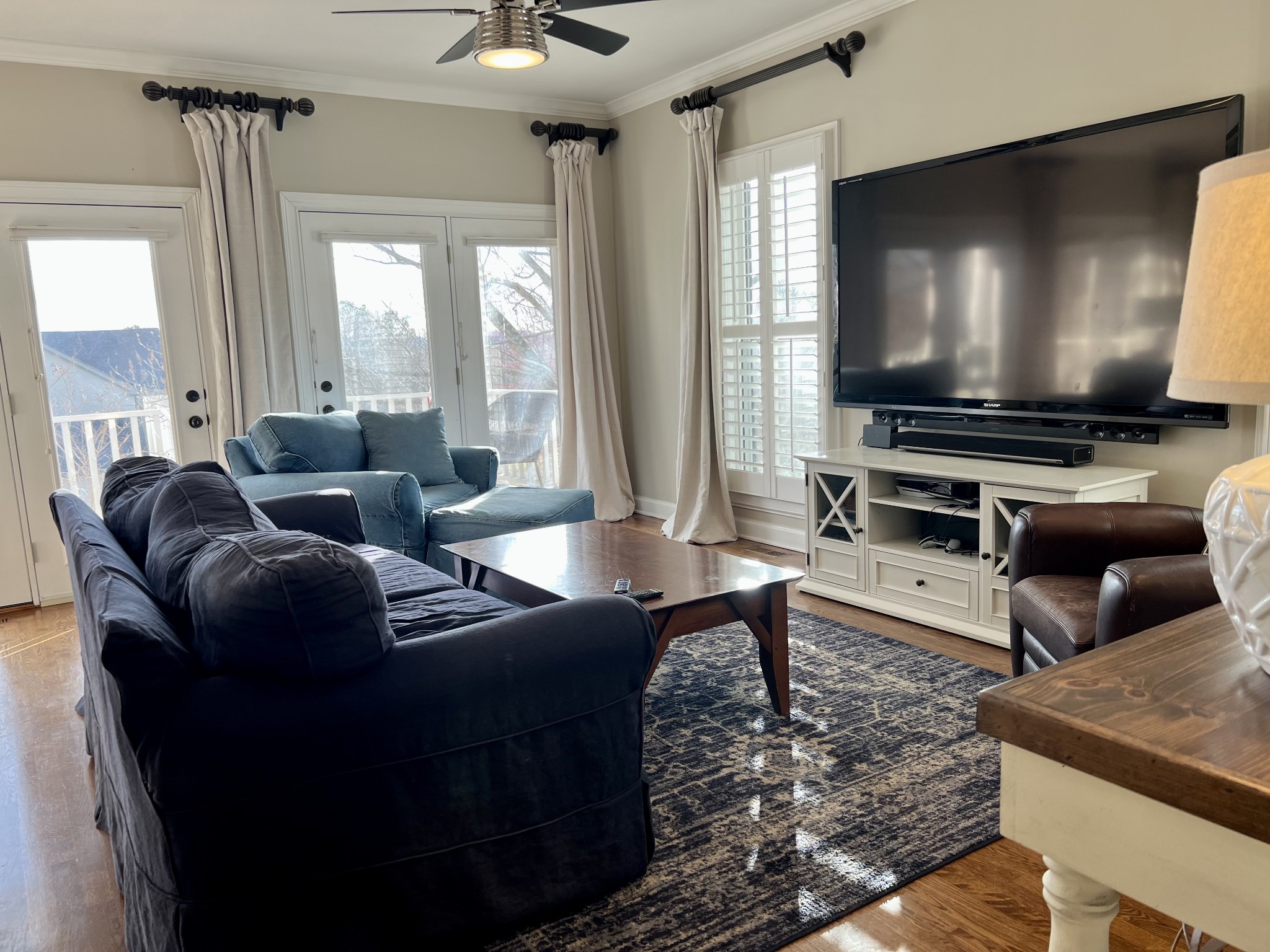 4264 Warren Road Franklin, TN 37067 - Photo 11 of 49 a living room with furniture and a flat screen tv