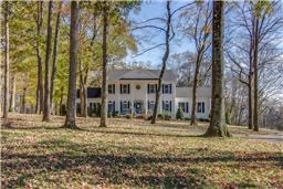 4264 Warren Road Franklin, TN 37067 - Photo 2 of 49 a front view of a house with a yard