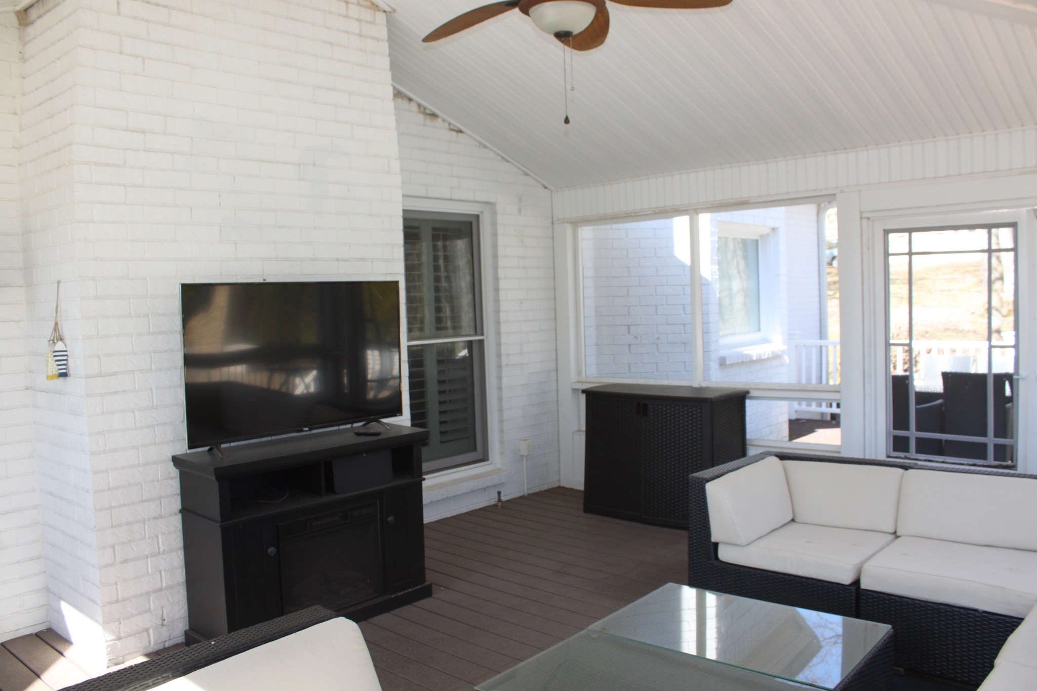 4264 Warren Road Franklin, TN 37067 - Photo 30 of 49 a living room with furniture and a flat screen tv