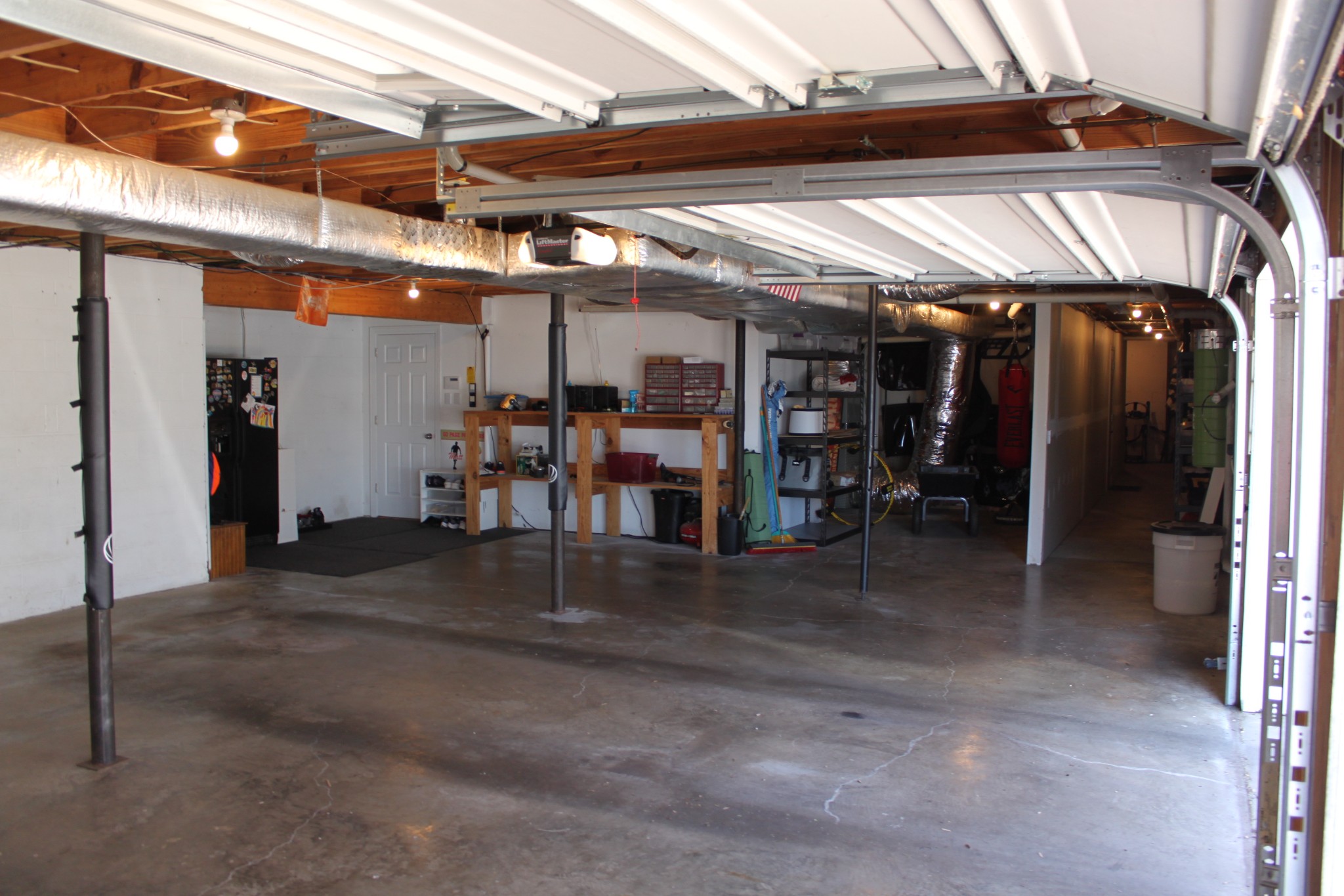 4264 Warren Road Franklin, TN 37067 - Photo 42 of 49 a view of water heater room with a table and chairs
